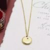 collier medaille createur