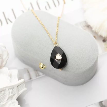 collier pendentif pierre noire