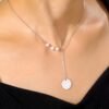 collier medaille perles