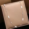 collier fin minimaliste tendance 2024